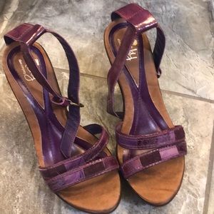 Purple real wood heels made in Brazil.